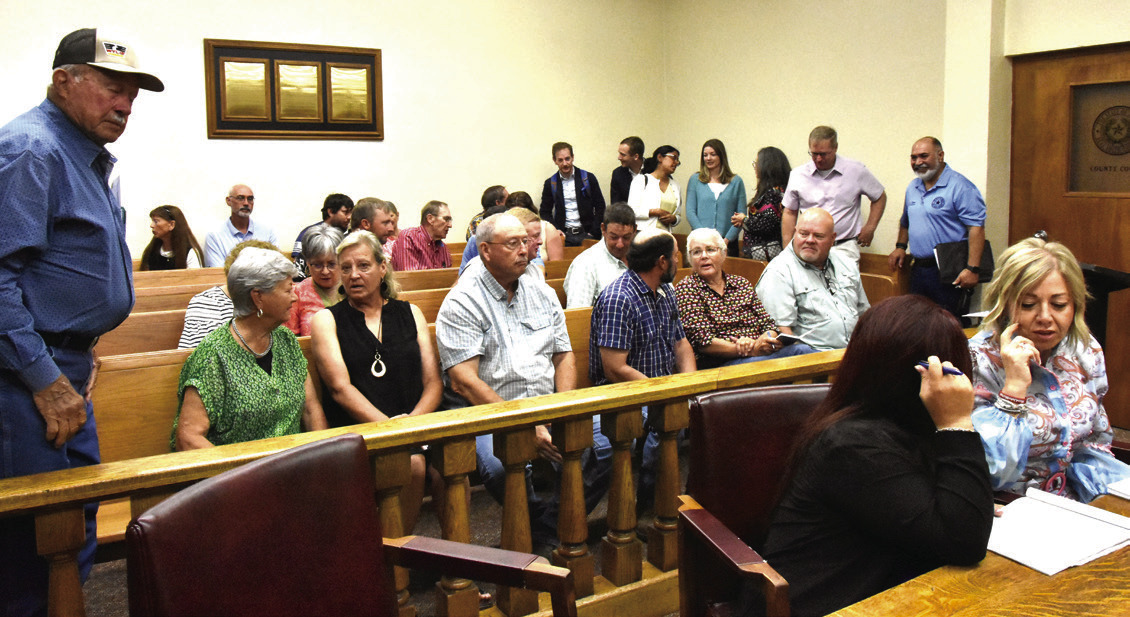 CROWD ON HAND--A large crowd of county and city residents was on hand in the County Courtroom of the Deaf Smith County Courthouse at the June 23 county commission meeting to hear and observe county commissioners give technology giant Google LLC and its affiliates along with IP Roman Gas property tax abatements on potentially billions of dollars worth of projects in Deaf Smith County over the next decade in return for substantial payment in lieu of taxes. (Photo by Jim Steiert)