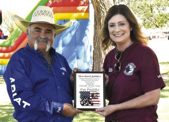 TOP FARMER/RANCHER--Pat Padilla accepts the Farmer/