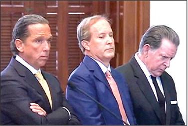 Suspended Attorney General Ken Paxton along with his attorneys Tony Buzbee and Dan Cogdell stood on the Senate floor as the impeachment trial began this week. Buzbee, on Paxton’s behalf, pleaded not guilty to all 16 articles.