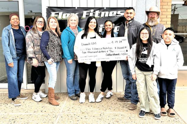 Dimmitt EDC presented a $10,000 grant check to Flex Fitness and Nutrition as part of their Small Business Incentive Program on Friday. Attending the presentation were (left to right) Joyce Thomas, EDC board member, Callen Edwards, EDC treasurer, JoAnna Blanco, EDC secretary, Maggi Lytle, EDC vice president, Yvonne Aguero and Ramon Aguero owners of Flex Fitness, and Matt Gfeller, EDC president.