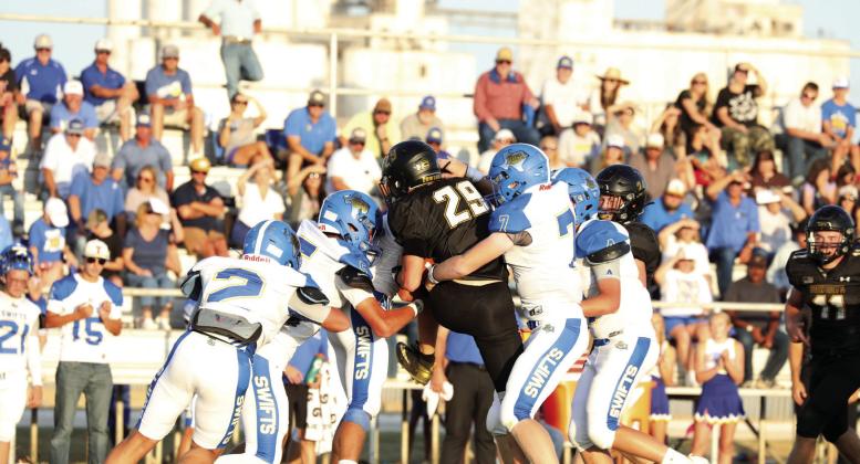 Rhett Eldridge (left) throws the ball for Nazareth against Happy Friday night.