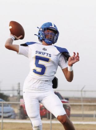 Rhett Eldridge (left) throws the ball for Nazareth against Happy Friday night.