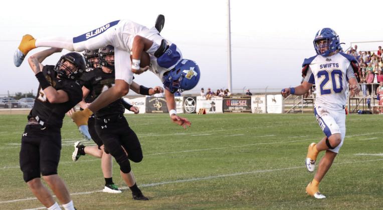 Rhett Eldridge (left) throws the ball for Nazareth against Happy Friday night.