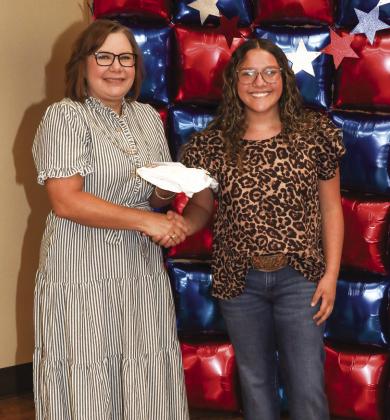 Tiffany Reed presented Kadence Pesina with a Project pin
