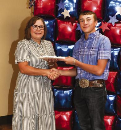 Tiffany Reed presented Rhett Reed with a Project pin