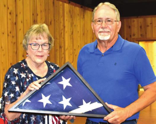 Nazareth Post 528 Commander Clyde Schulte and Angie Milton of the American Legion Auxiliary presented an encased wall hanging flag to the family of William C. “Junior” Hochstein.