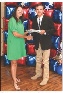 Christina Flowers presented Weston Wheeler with a Project pin