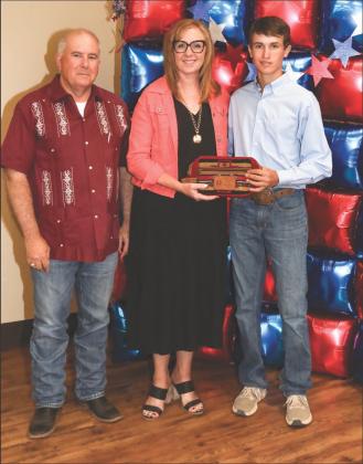 Jason Wade presented the Teen Leader Award Outstanding Junior Record Book-Grayson No- Outstanding Junior Record Book - Benson Van Jay Wade and Bilynn Johnson presented the'l to Kannon Flowers len Dare You' Award to Krese Barbee