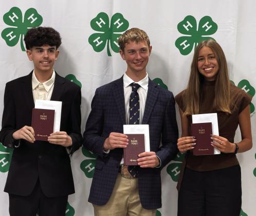 At Sunday’s Deaf Smith County 4-H Banquet I Dare You Awards were presented to (above, from left) Max Hedrick, Sam Detten and Macy Betzen. Right, Max Hedrick and Andrew Mathews were awarded Gold Star Awards.