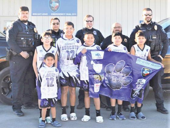 The Dimmitt Police Department helped with a sendoff for group of young Dimmitt basketball players and their coaches for a trip to Denver, Colorado for a basketball tournament. After the boys played, they had the opportunity sit on the Denver Nuggets’ bench and interact with players as they warmed up for the Nuggets vs Hornets game.