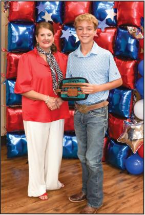 Calley Runnels presented Outstanding Intermediate Record Book to Hudson Butler