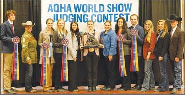 The West Texas A&amp;amp;M University horse judging team recently won two major championships, including the National Reining Championship. Pictured are team members Trenton Hammerand,National Reining Horse Association representative Patti Carter, Lauryn Harris, Jennica Dannehl, Shanna Marquart, Anna Wilhelm, Anya Katz, Jillian Melendez, Marty Kacsh, Makenzie Knipe, Maggie Murphy and Coach John Pipkin. (Photo provided by WTAMU)