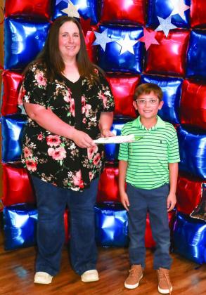 Tori Dunn presented Lincoln Venhaus with a Project pin
