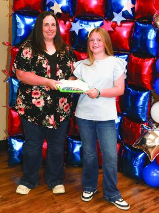 Tori Dunn presented Claire Martin with a Project pin