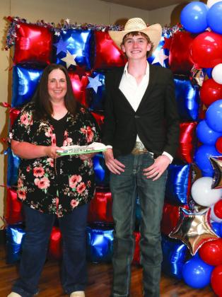 Tori Dunn presented Henri Nolen with a Project pin