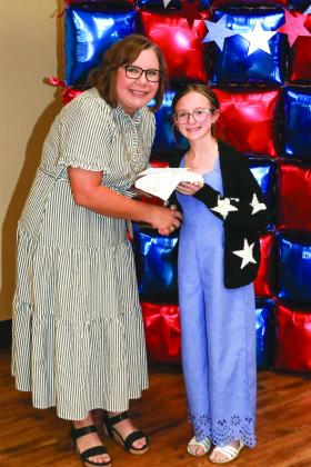 Tiffany Reed presented Madilyn Langston with a Project