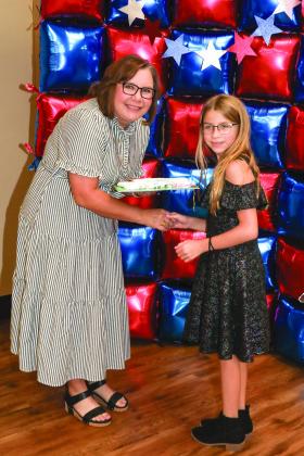 Tiffany Reed presented Raylee Webb with a Project pin