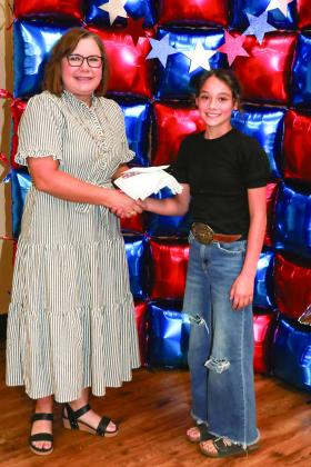 Tiffany Reed presented Kenleigh Pesina with a Project