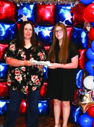 Tiffany Reed presented Samantha Gazda with a Project pin Tori Dunn presented Laura Mote with a Project pin