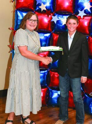 Tiffany Reed presented Peyton Finck with a Project pin
