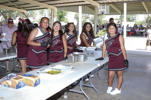 Tulia Cheerleaders served BBQ meals at the Picnic lunch