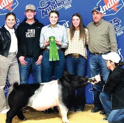 Nazareth Lexi Ramaekers placed 6th with her Dark Cross and made the sale at the San Antonion Livestock Show.