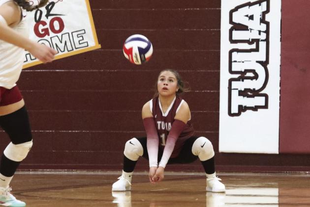 Mariah Briones returns the ball