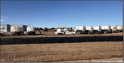 MASSES OF EQUIPMENT--Water trucks and heavy equipment are amassed adjacent to the site of old La Plata, the one-time Deaf Smith County seat as work proceeds on ground preparation for data centers in central Deaf Smith County (Courtesy Photo)