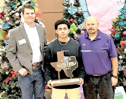 Last Thursday, Jon Garland from Whiteface Ford in Hereford presented DHS football player Tony Salazar with the Built Ford Tough Player of the Week Award. The award was based on the game against the Highland Park Hornets where Salazar came in with 396 yards on 23 attempts and seven touchdowns. DHS head coach Johnny Nino joined Salazar at the presentation. Salazar was also named All-District 1st Team Running Back this season.