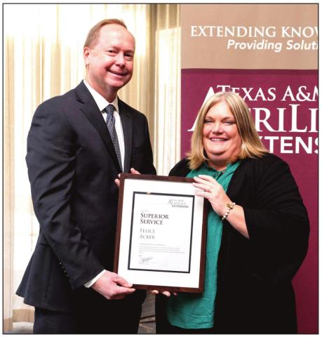 Rick Avery, Ph.D., Interim Director of Texas A&amp;M AgriLife Extension Service, presented the Superior Service Award to Felice Acker, CEA, Castro County AgriLife Extension agent.