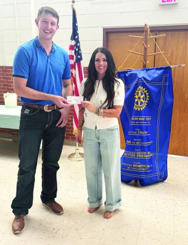 Tulia Rotary Club recently made a donation to the Outcome. Sterling White presented the donation to Nichole Schmalzried at the Rotary Club meeting.