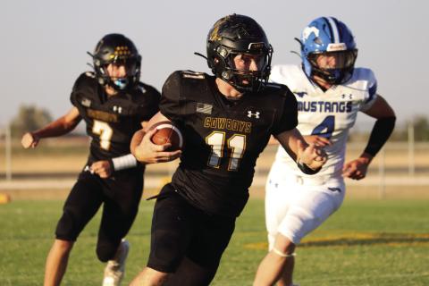 RUSHING TOWARDS GREATNESS With his sights on the end zone, senior Luke Dempsey skillfully runs the ball down the field on Sept. 18, 2026. Photos by Jessica Vasquez