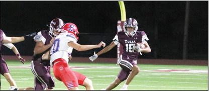 Gabriel Dominguez finds room to run after intercepting a pass Friday.