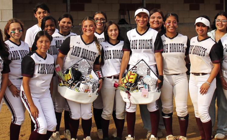 Lady Hornet Softball team celebrates with seniors Kyla Rodriguez and Dulce Abeja