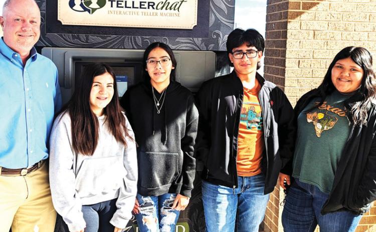 Dimmitt Middle School’s Family Consumer Science Advance Class toured the First United Bank in Dimmitt. The class is studying a unit on dollars and senses, banking services/checks and balances, and understanding the value of money. (left to right) Cody Cleavinger, Jasmine Lopez, Kamyla Granados, Mark Alonzo and Maraceli Anima.