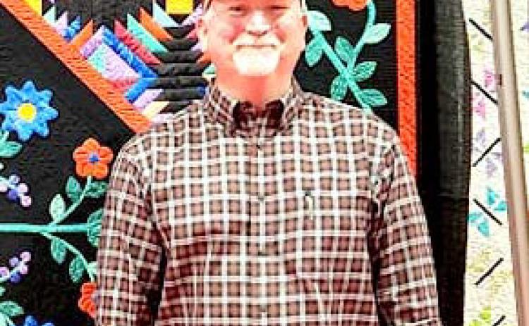 Daniel Holley was the raffle winner for the quilt at the Ogallala Quilt Festival.