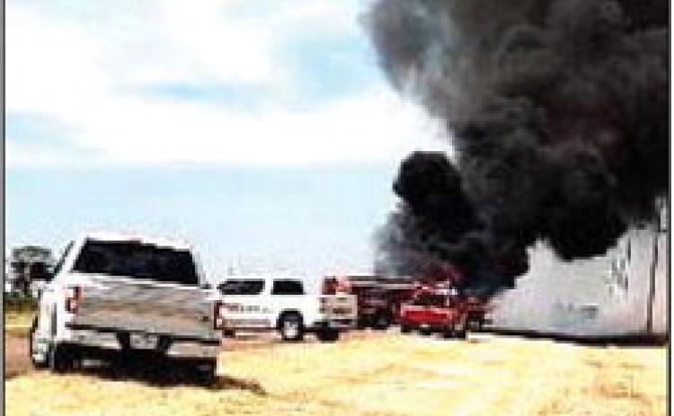 First responders battle tractor fi re
