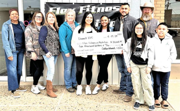 Dimmitt EDC presented a $10,000 grant check to Flex Fitness and Nutrition as part of their Small Business Incentive Program on Friday. Attending the presentation were (left to right) Joyce Thomas, EDC board member, Callen Edwards, EDC treasurer, JoAnna Blanco, EDC secretary, Maggi Lytle, EDC vice president, Yvonne Aguero and Ramon Aguero owners of Flex Fitness, and Matt Gfeller, EDC president.