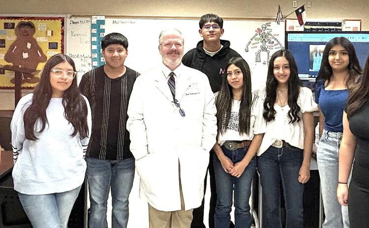 Dimmitt High School health science students attended a Health Science Career Day with Dr. Fulkerson from Tulia Family Chiropractic. Students learned about the pathway of a chiropractic doctor, how to do a quick posture assessment, and how to prevent posture issues related to carrying backpacks and watching phones.