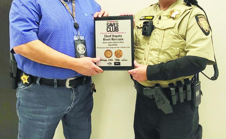 Castro County Sheriff Sal Rivera (left) pictured with Castro County Chief Deputy Brent Harrison. Harrison was recognized recently at a firearms show in Las Vegas, Nev.
