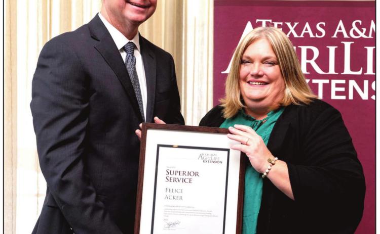 Rick Avery, Ph.D., Interim Director of Texas A&amp;M AgriLife Extension Service, presented the Superior Service Award to Felice Acker, CEA, Castro County AgriLife Extension agent.