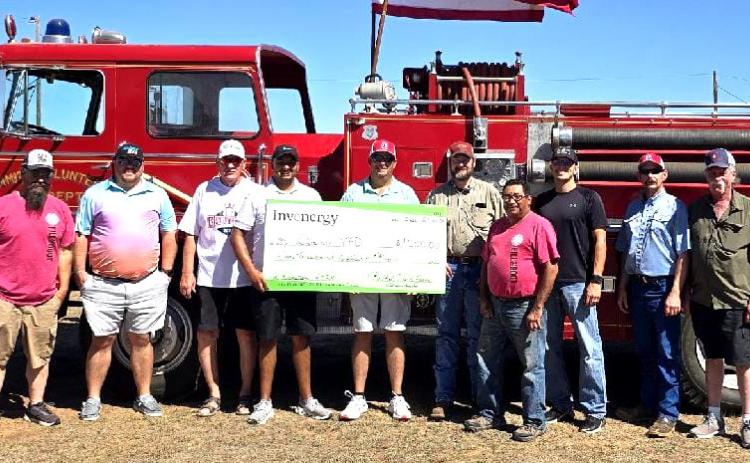 Dimmitt Volunteer Fire Department received a $1,000 check from Invenergy/ Bethel Wind Farm.
