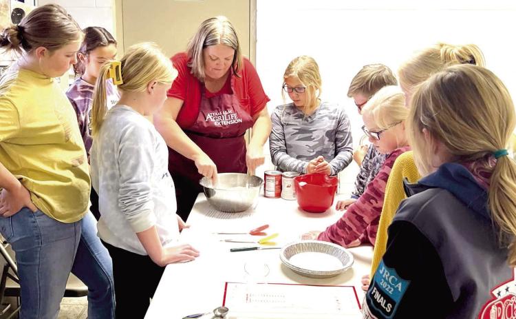 Castro County Extension Agent Felice Acker assisted and taught 4-H youth how to make pies at the annual Thankful for Pie workshop.