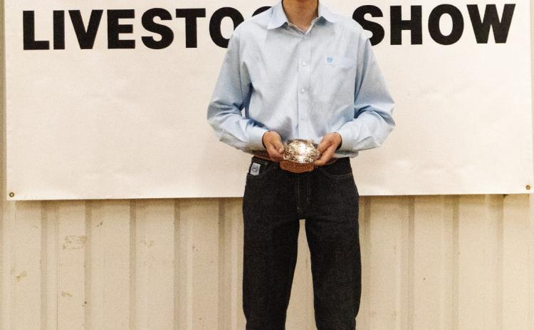 Champion Swine Showmanship-Kannon Flowers Photo by Avary Wesley