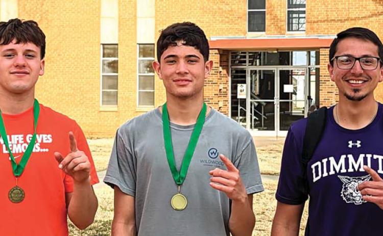 DHS Tennis/Boys Doubles Team - David Fuentes and Emiliano Peralta with Coach Holguin - first place at South Plains College.