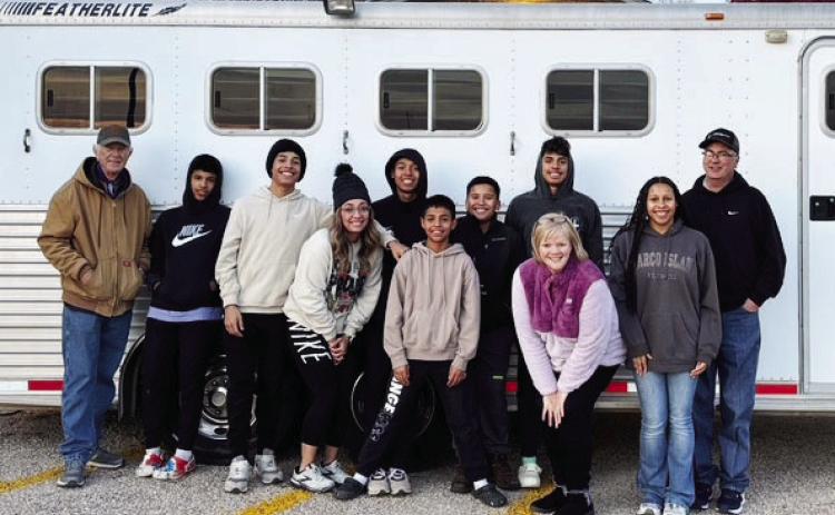 The Cantrell Family with volunteers from Dimmitt loading a trailer for delivery.