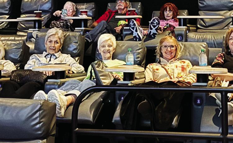 La Madre Mia met for dinner and a movie in Amarillo on October 9. They saw the movie Soul on Fire on its opening night at Cinergy. Members present are pictured ready to see the movie.