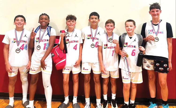 Premier League EOS Tournament Champs. Seven boys finished off the Spring Premier League winning the tournament championship game 55-41, even while missing several players, they played phenomenally. (left to right) Davin Franco, Brownfield, Jayvon Sholars, Lubbock, Jager Thiessen, Lubbock, Edgar Perez, Dimmitt, Asher Elle, Southland, Owen Urrutia, Lubbock, and Paxton Fleischman, Lubbock, Maddox Waldrip, Abernathy, Jaxon Solis, Lubbock, and Eli Ikemba, Lubbock.