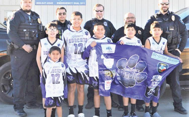 The Dimmitt Police Department helped with a sendoff for group of young Dimmitt basketball players and their coaches for a trip to Denver, Colorado for a basketball tournament. After the boys played, they had the opportunity sit on the Denver Nuggets’ bench and interact with players as they warmed up for the Nuggets vs Hornets game.