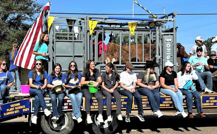 The Nazareth Ag and FFA students participated in the annual Labor Day Parade this past weekend, complete with a live bovine in the working chute on the float.